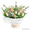 Oranžové a bílé tulipány v manžetě